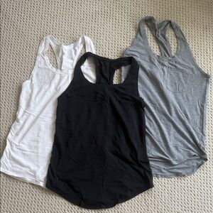 Lululemon Women's Sleeveless Racerback Tank Tops - Black, White, and Gray Size 4